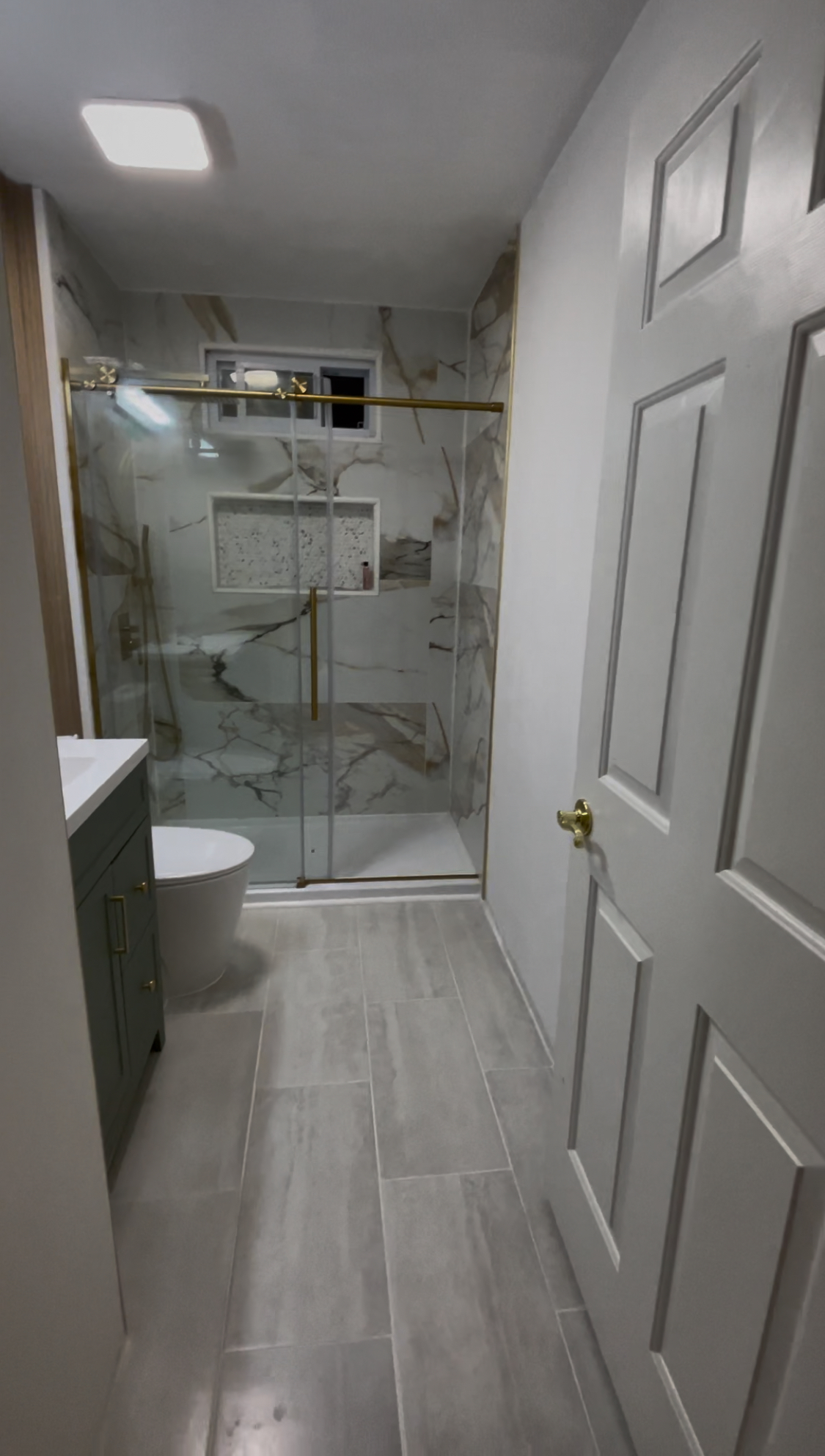 Completed bathroom tile installation by Tillerstead in South Jersey